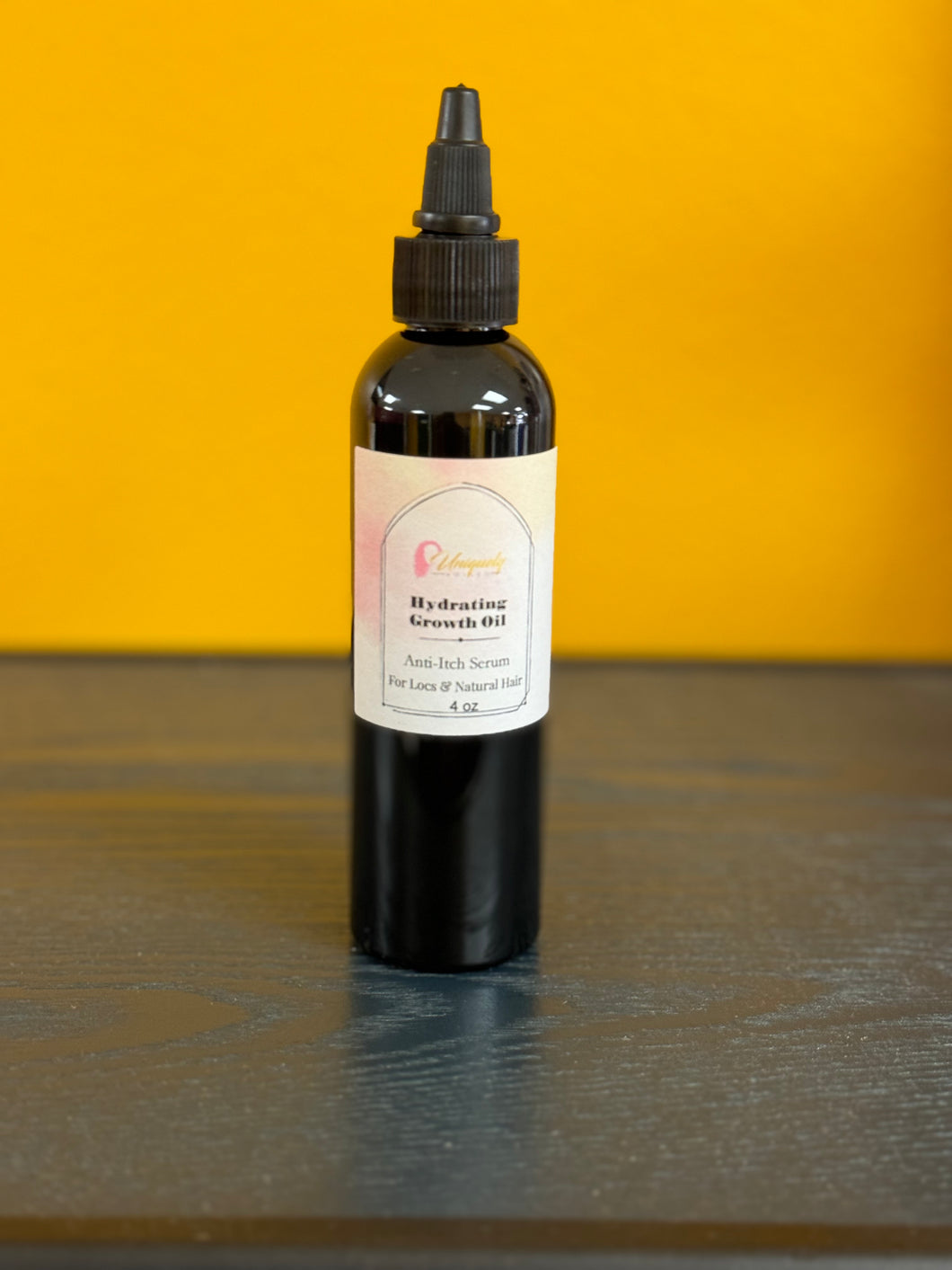 Uniquely Koiled Hydrating Growth Oil